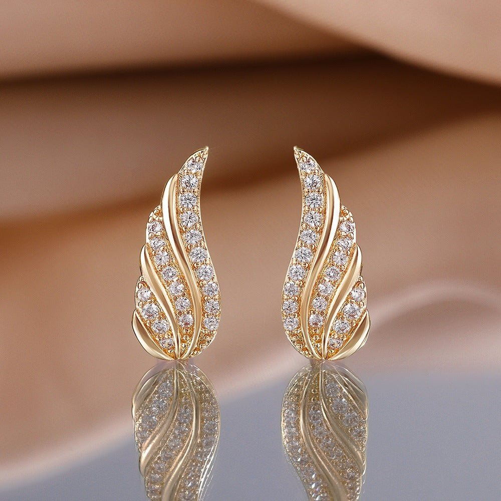 Boucles d'oreilles feuille moderne pavée | Or
