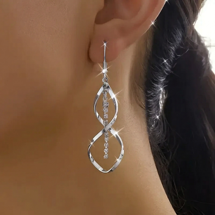Boucles d'oreilles spirale rayon de soleil | Or blanc