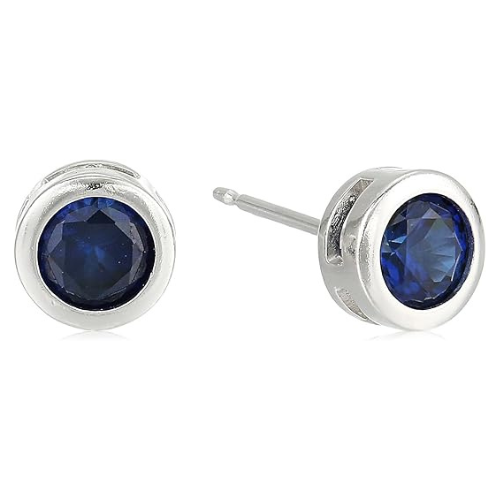 Boucles d'oreilles à clou avec sertissage en saphir | Or blanc