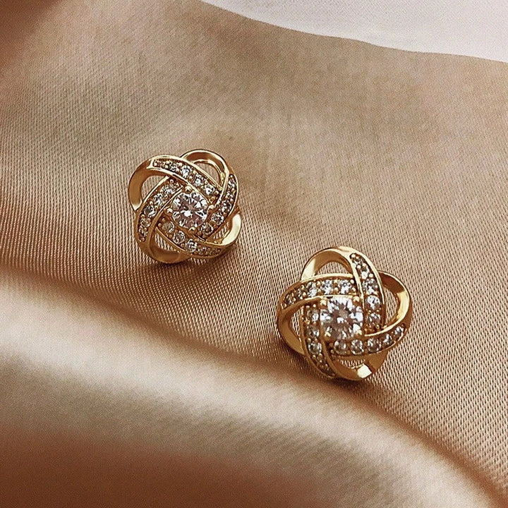 Boucles d'oreilles avec des billes en zirconium | Or
