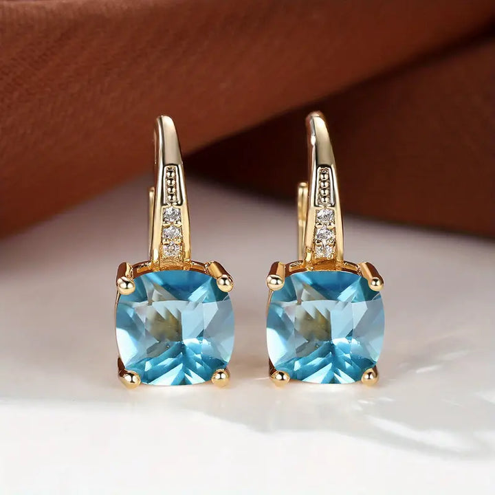 Boucles d'oreilles créoles en pierre de saphir mystique | Or