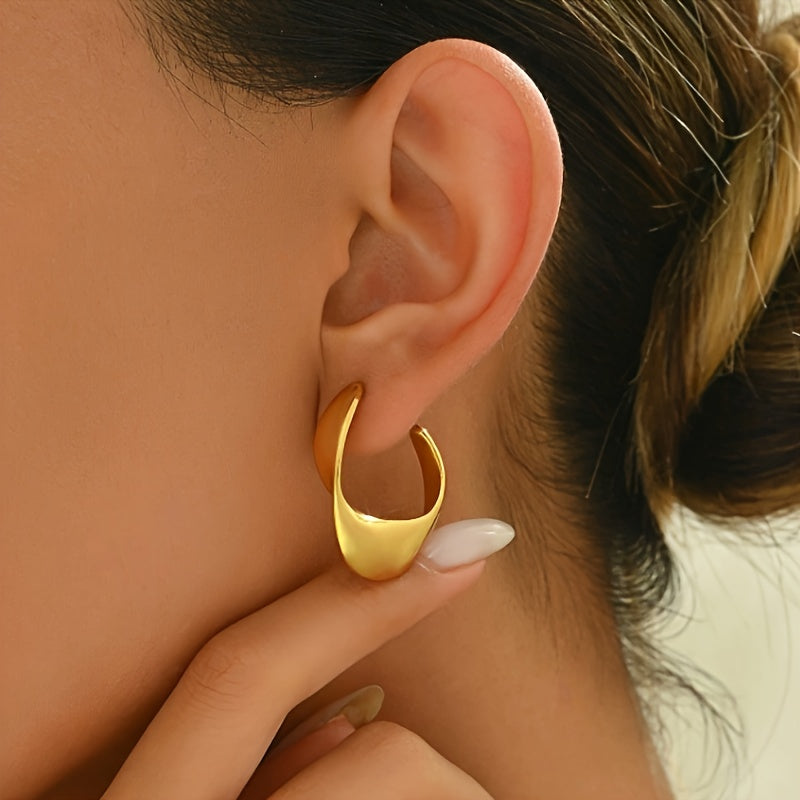 Boucles d'oreilles créoles sculptées en croissant | Or