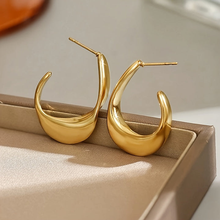 Boucles d'oreilles créoles sculptées en croissant | Or