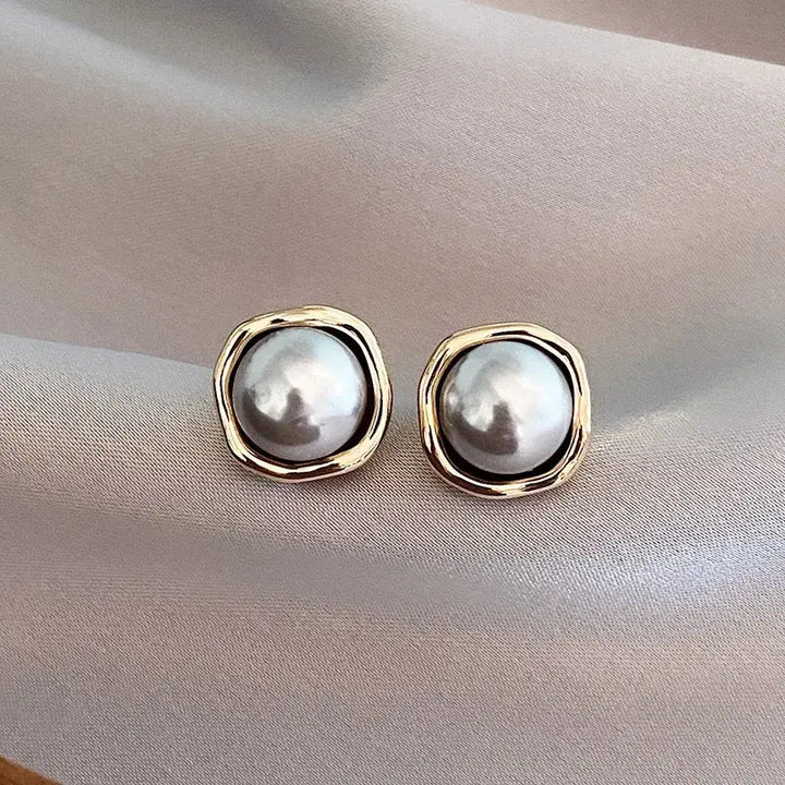 Boucles d'oreilles élégantes en perle noire | Or