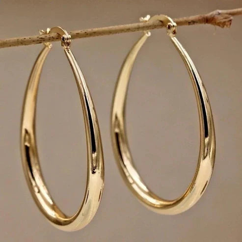 Boucles d'oreilles rétro en forme d'anneau | Or