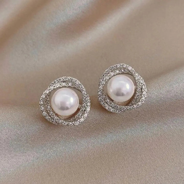 Boucles d'oreilles spirales brillantes avec des perles élégantes | Or