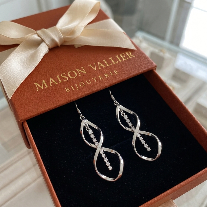 Boucles d'oreilles spirale rayon de soleil | Or blanc