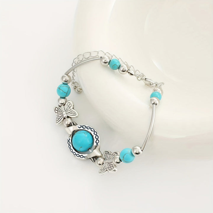 Bracelet Oasis Vol de papillon | Or blanc