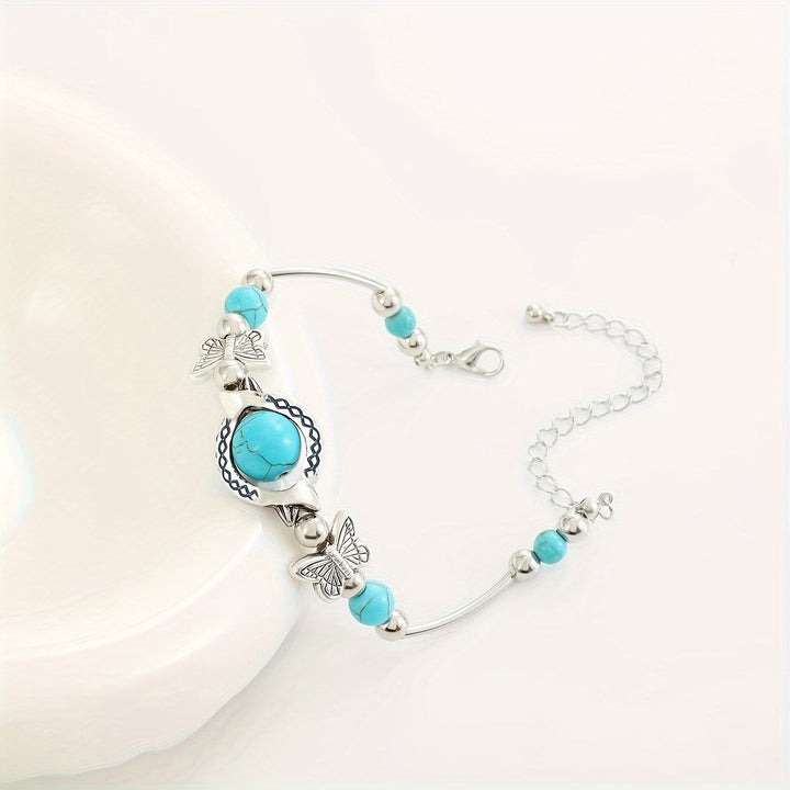 Bracelet Oasis Vol de papillon | Or blanc