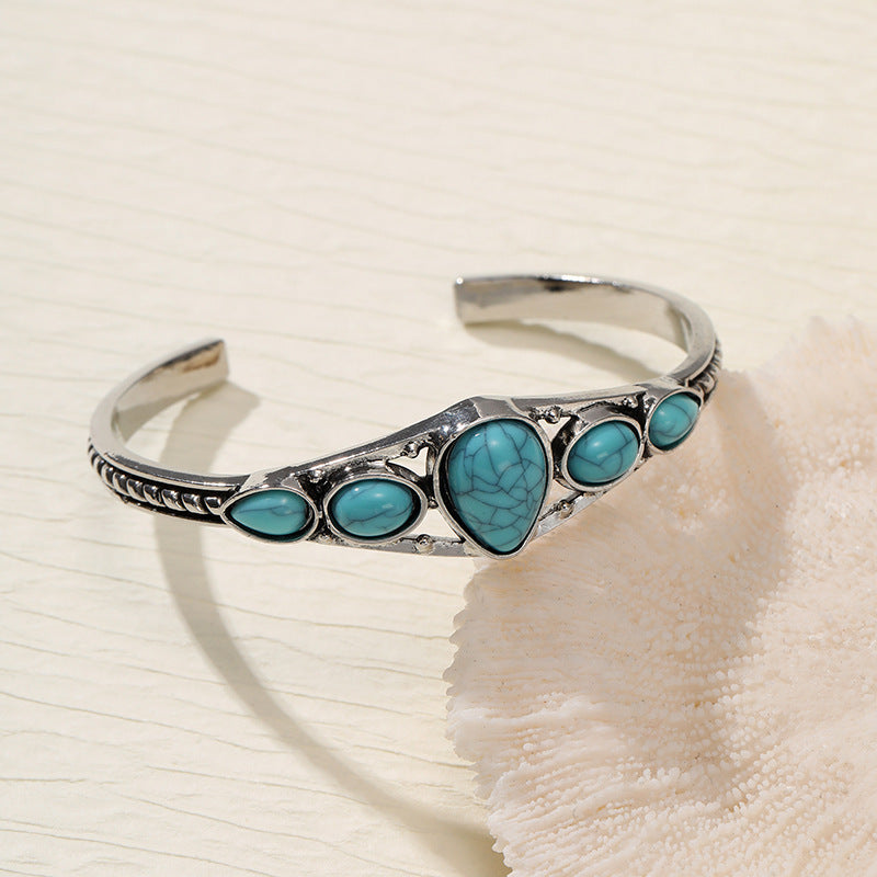 Bracelet ouvert en forme de goutte d'eau turquoise | Or blanc