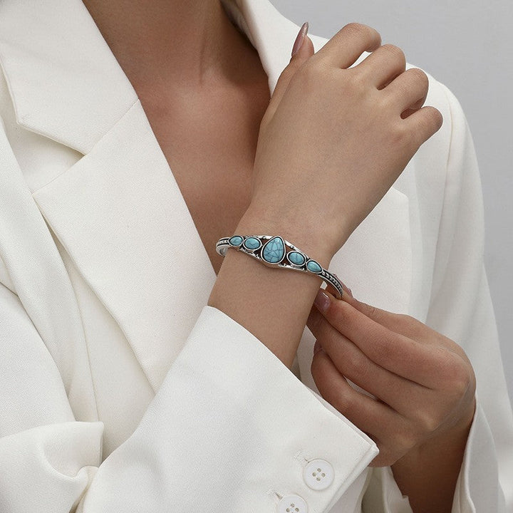 Bracelet ouvert en forme de goutte d'eau turquoise | Or blanc