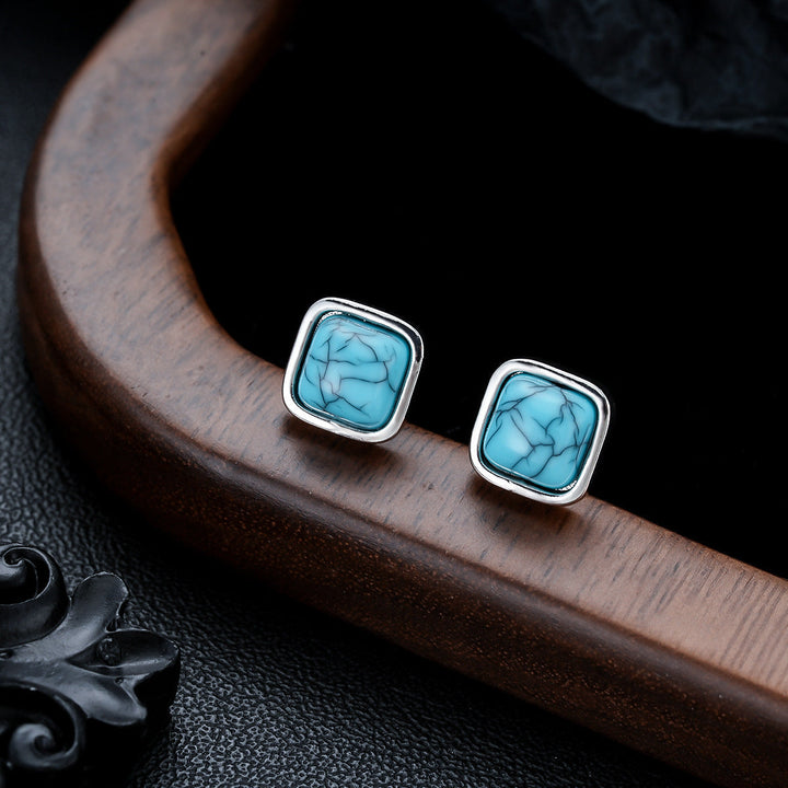 Clous carrés turquoise | Or blanc