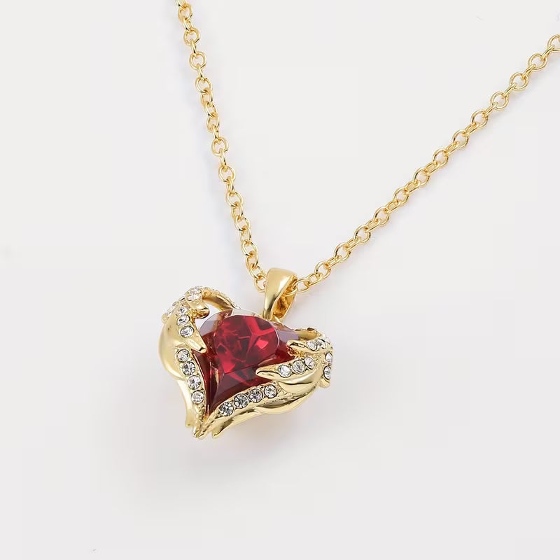 Collier de cœur en rubis étreinte d'ange | Or