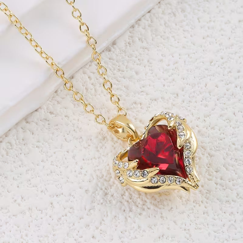 Collier de cœur en rubis étreinte d'ange | Or