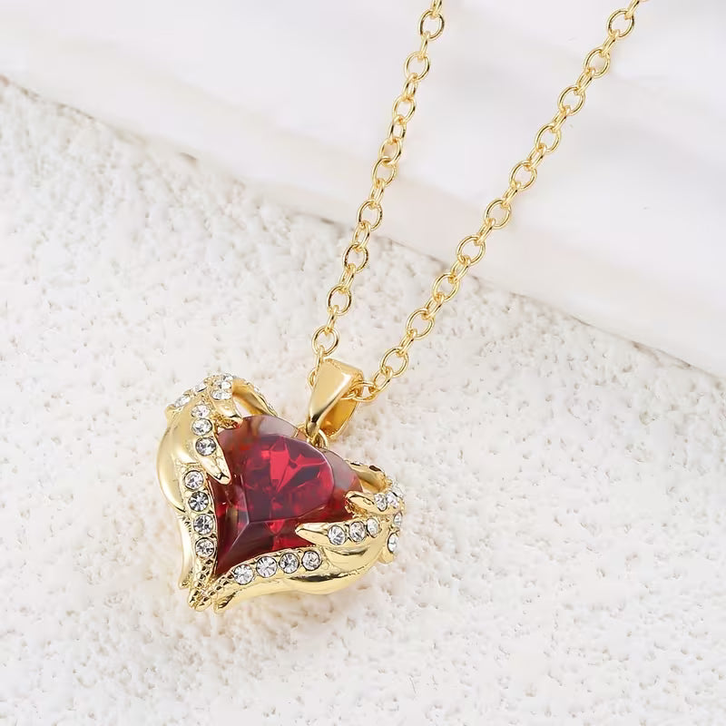 Collier de cœur en rubis étreinte d'ange | Or